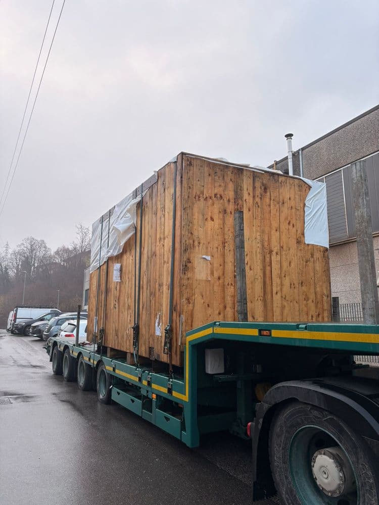 42-tonne pressure vessel in a wooden crate, lashed onto a semi-low-loader in Northern Italy
